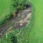Inšpektorat povzročitelju odredil odstranitev blata v Vodulah